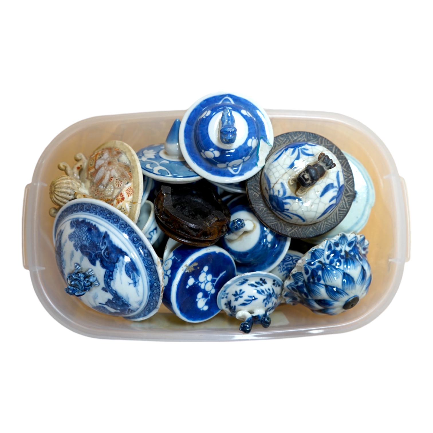 A quantity of various Chinese blue and white porcelain covers, 18th century and later and a Japanese satsuma porcelain cover. Condition - varies